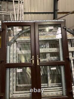 Brand new upvc french door in rosewood/ white 1770 x 2090 open out