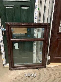 Brand new upvc rosewood window fully glazed 975 W x 1200 h bottom opener