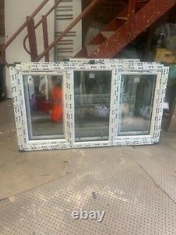 Brand new upvc window bottom openin sash 1740x1000 fully glazed rosewood/white