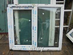 New White UPVC and Rosewood Window 1190 x 1005 A-Rated