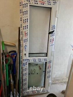 Upvc door and frame, white, brand new, handles and keys included. Cost £650